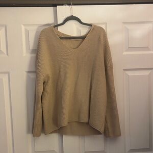 Relaxed V-Neck Ribbed Sweater in Light Beige